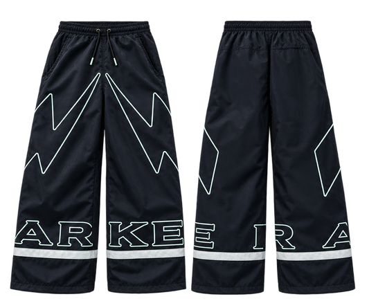 A multi-view product collage of black wide-leg sweatpants with white graphic patterns, 'ARKE' text, and reflective striping, including a model's lower body on the right and close-up detail insets along the bottom.